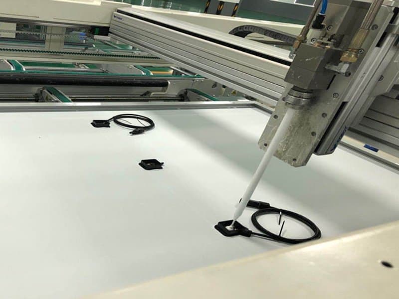 Laminated modules moving through the line